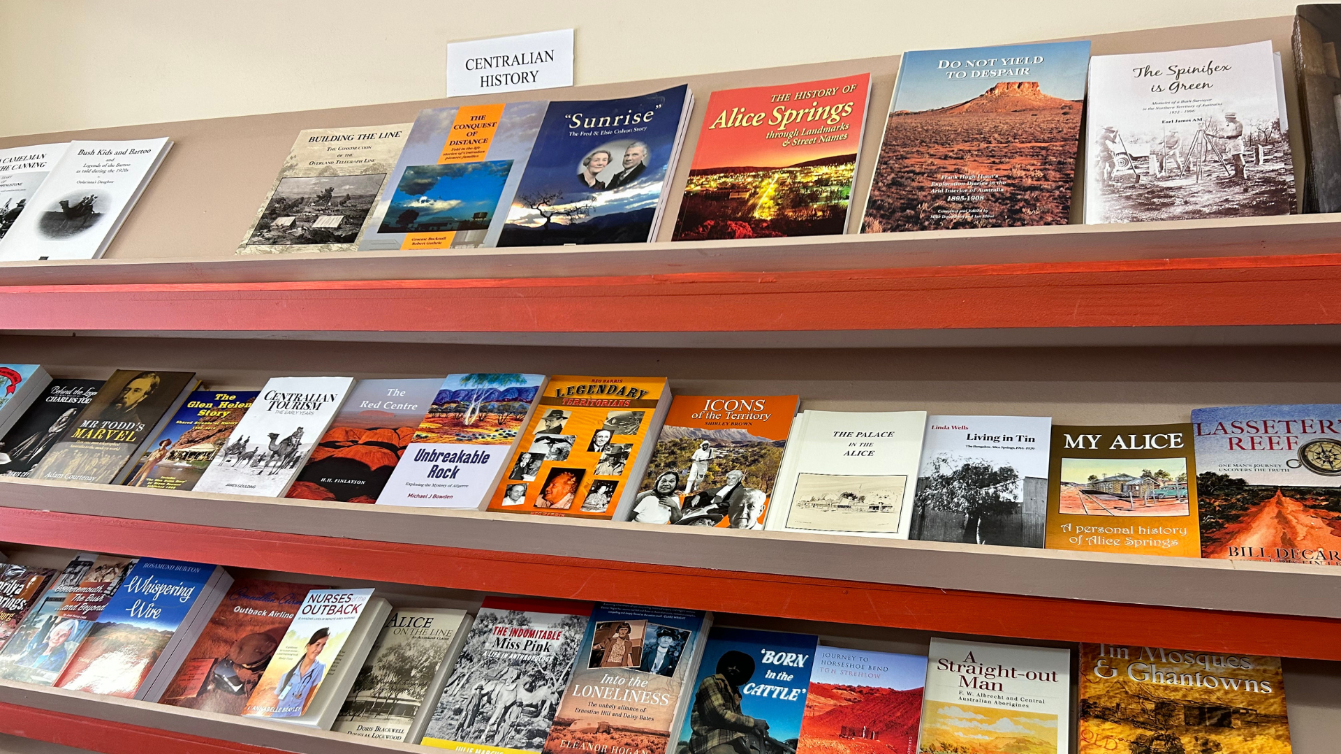 Bookshelves lined with Centralian history books