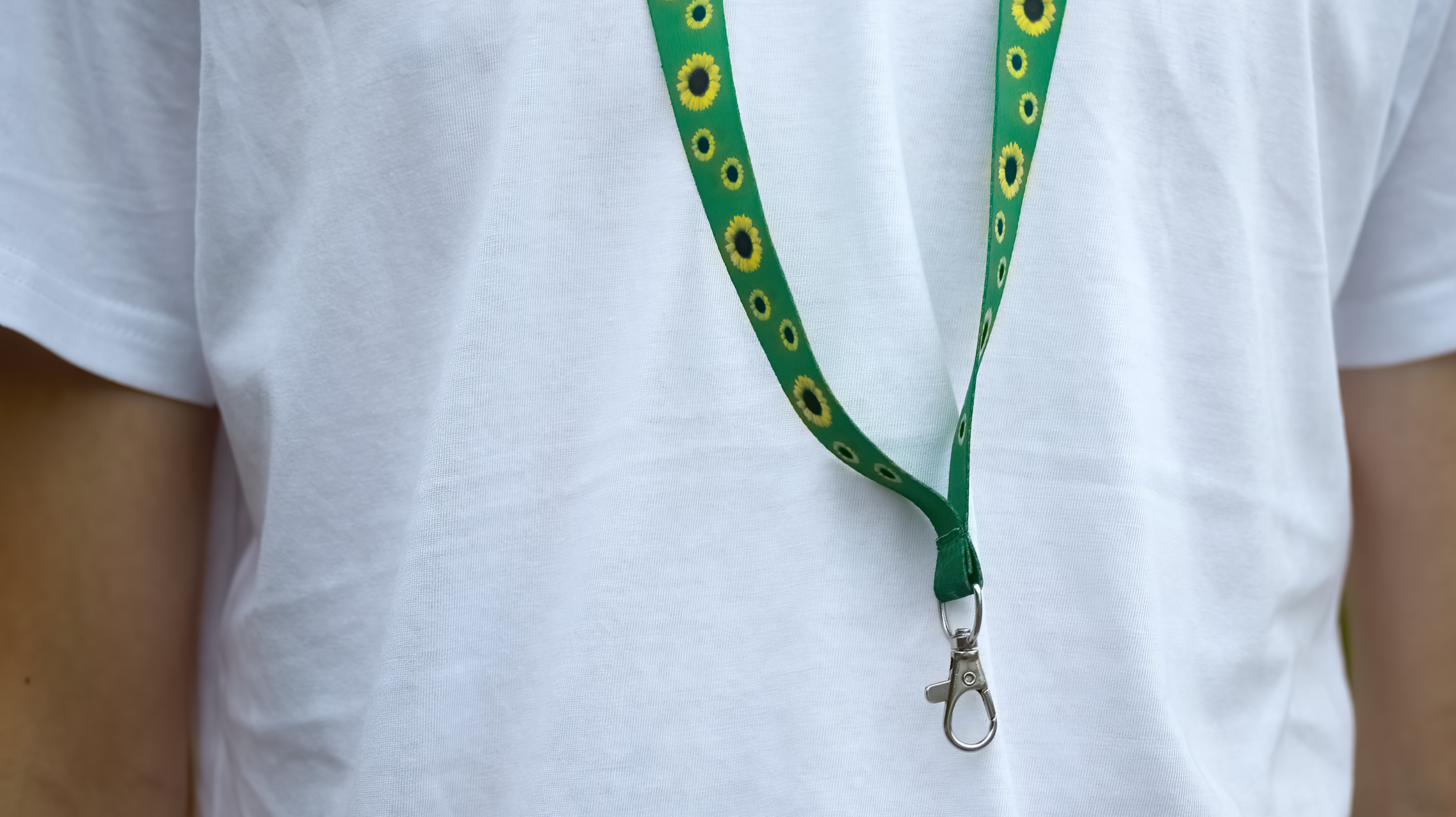 a torso, with a lanyard hanging around the neck