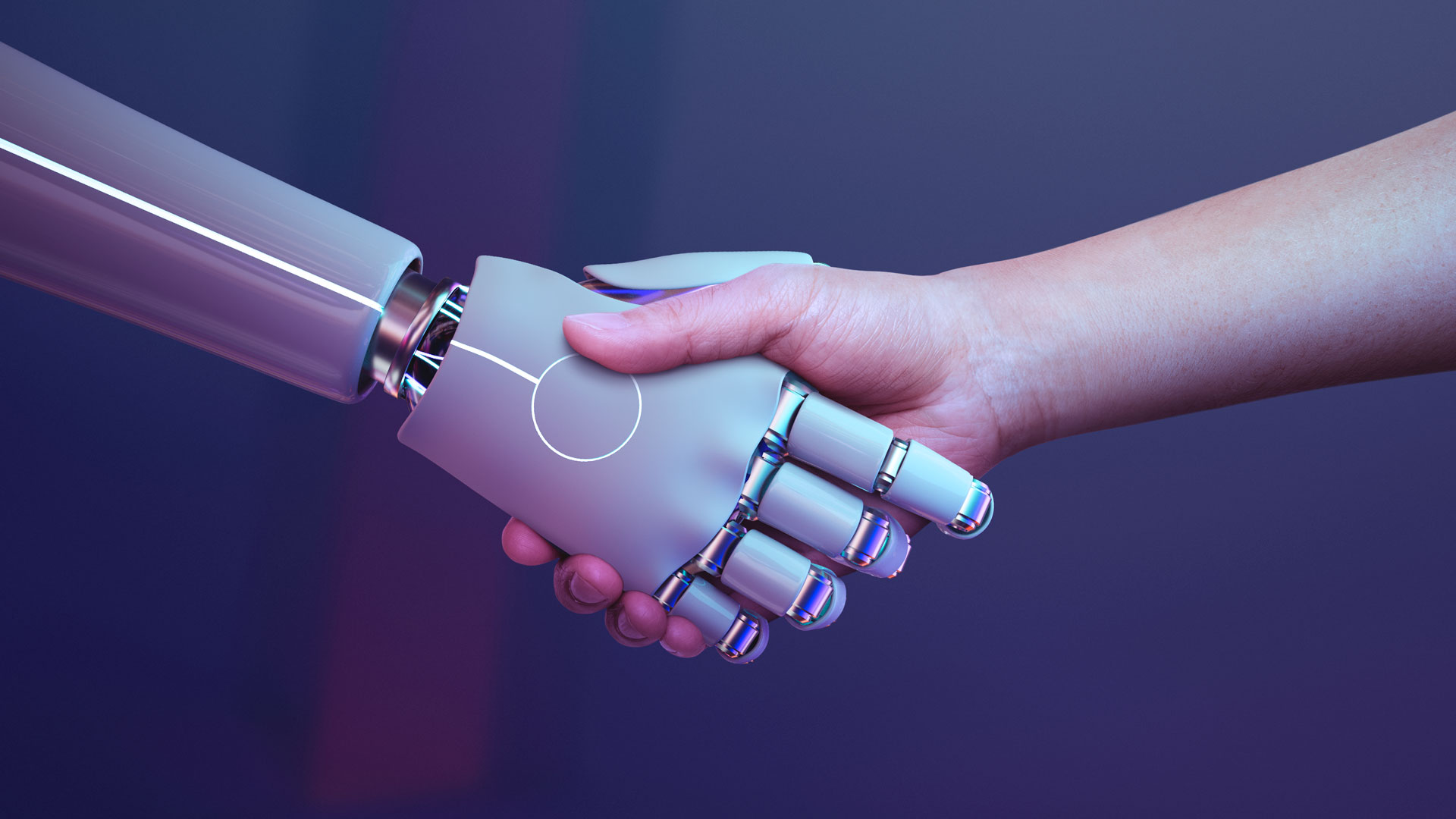 Human hand shaking a robotic hand, symbolising collaboration between people and artificial intelligence