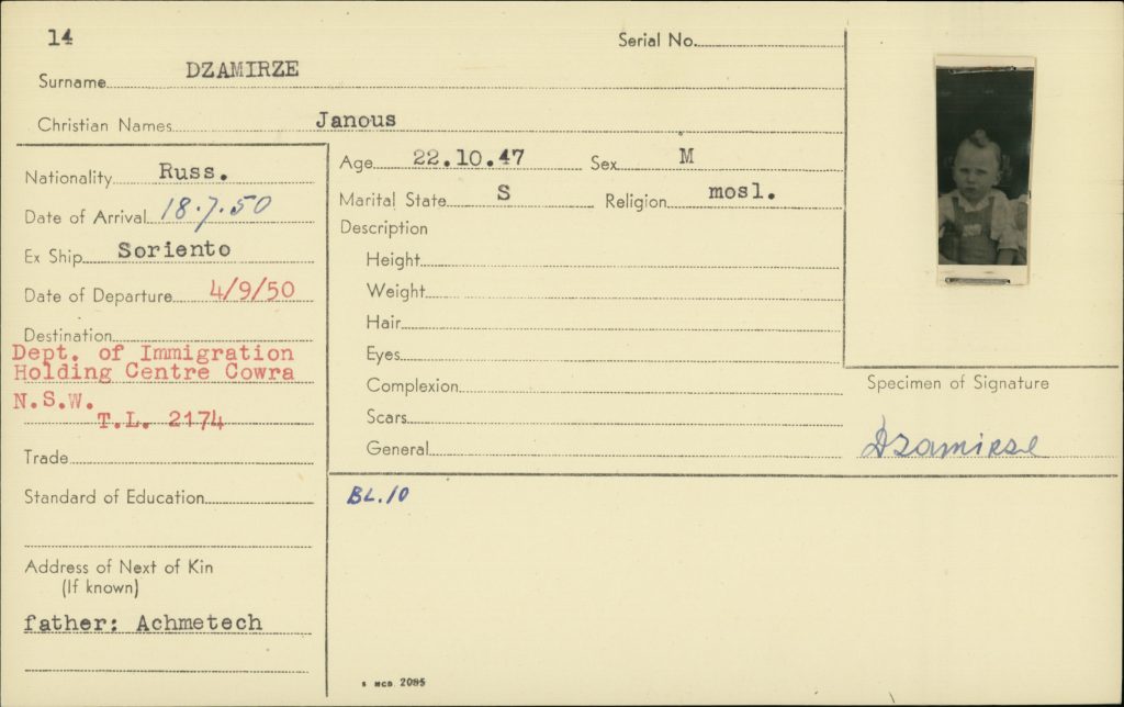 Immigration identification card for Janous Dzamirze, a Russian-born child who arrived in Australia on the ship Soriento on 18 July 1950. The card records his date of birth as 22 October 1947, marital status as single, and religion as Muslim. A small black-and-white portrait photograph of a young child is attached on the right.